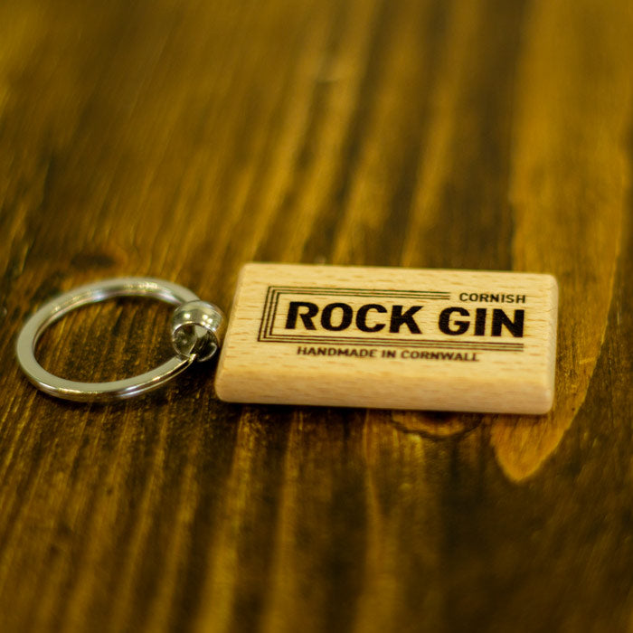 Company Logo Laser Engraved on to a wooden rectangular Keyring.